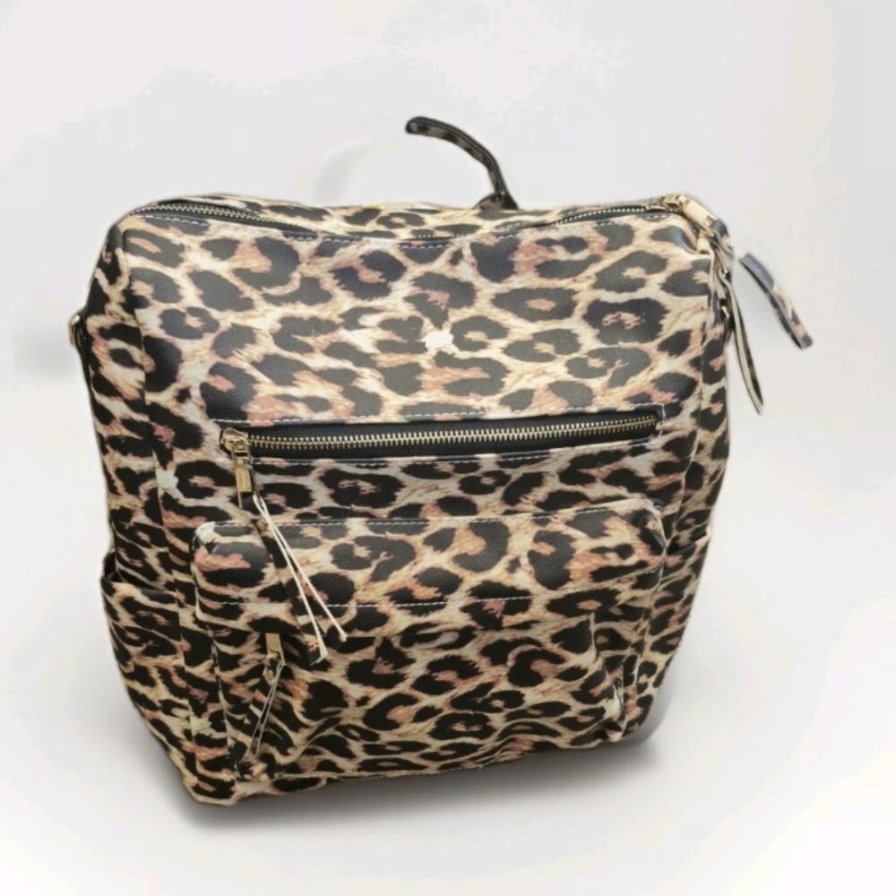 New with tags Ladies Animal Print Backpack Style Handbag
